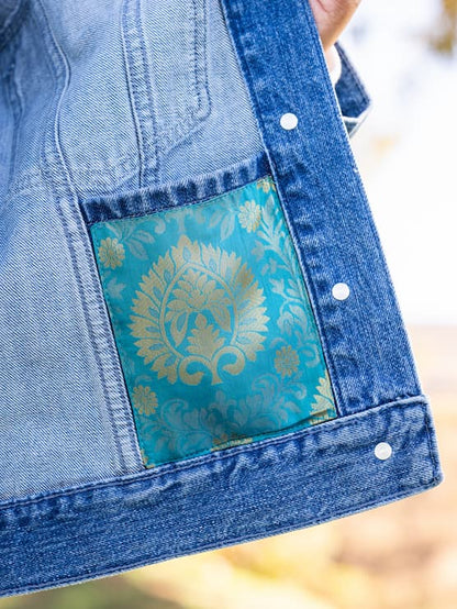 Inside pocket of Indo-western denim jacket with vegan silk saree panels in blue