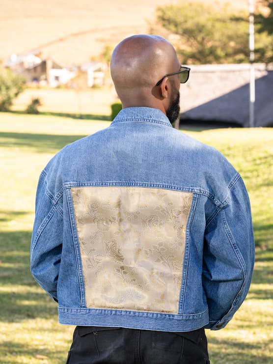 Back view of Indo-western denim jacket with vegan silk saree panels in white